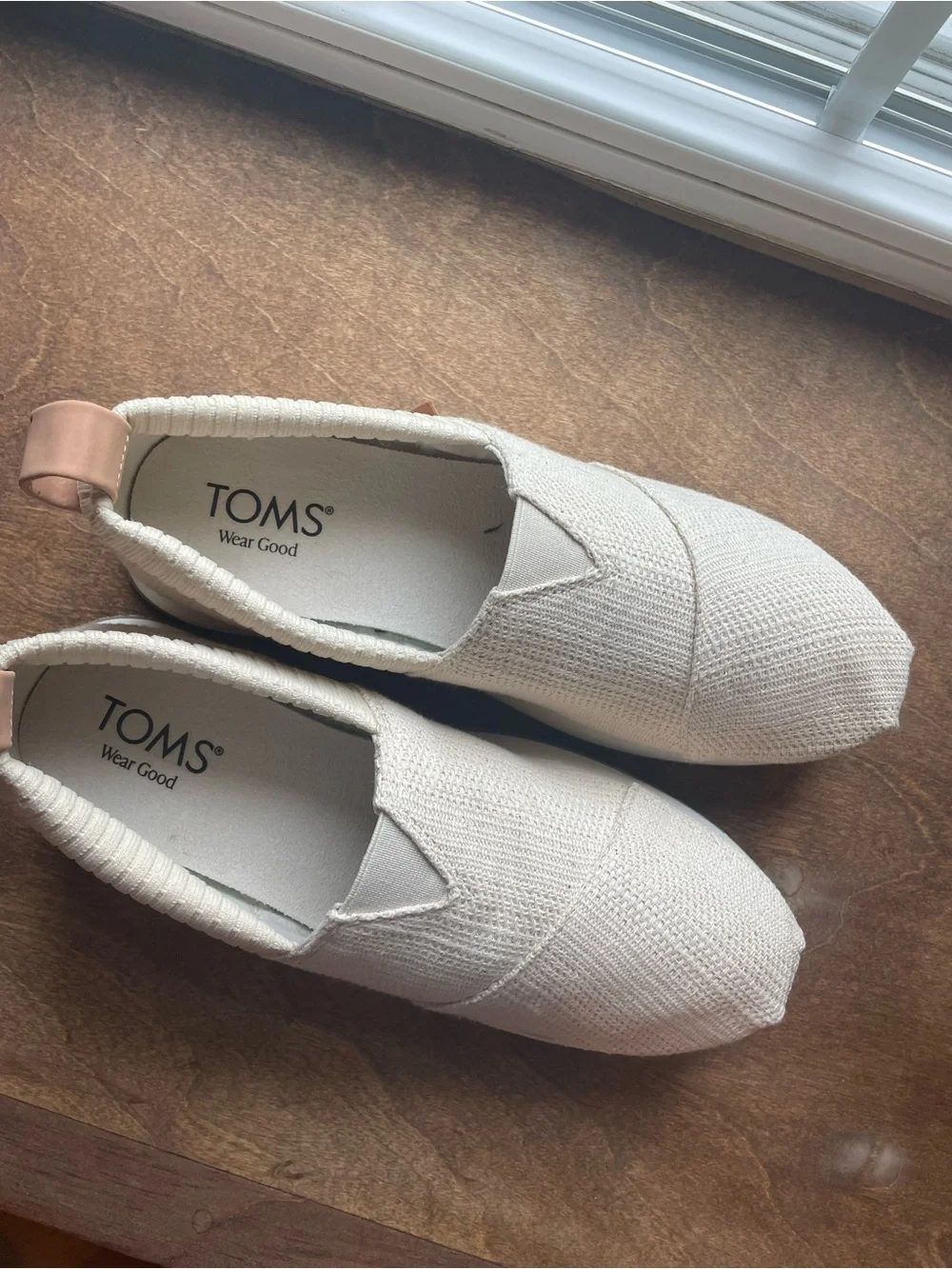 TOMS Women's Slip-On Flats in Cream with Blush Heel Tab